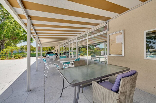 1144 Lanyard St, Palm Harbor, FL 34685 - view of patio featuring outdoor dining space