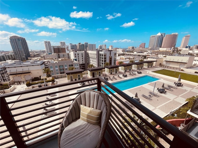 balcony featuring a skyline view