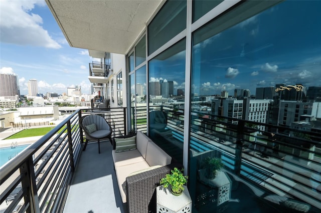 balcony featuring a city view