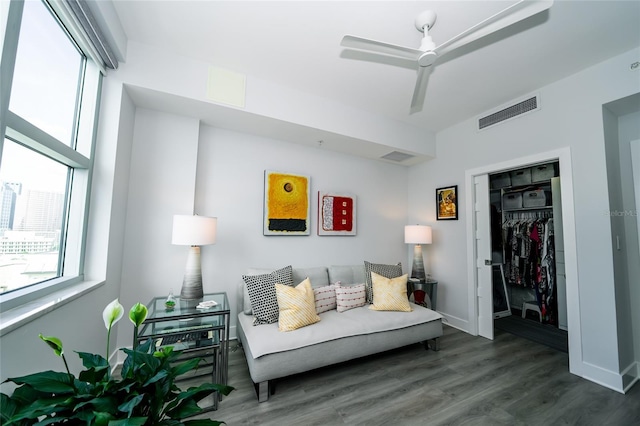 1120 E Kennedy Blvd Unit 1208, Tampa, FL 33602 - living area featuring healthy amount of natural light, wood finished floors, and ceiling fan