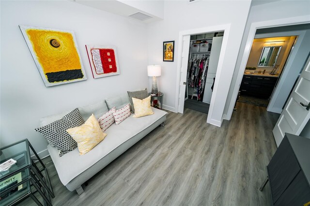 1120 E Kennedy Blvd Unit 1208, Tampa, FL 33602 - living area featuring wood finished floors and baseboards