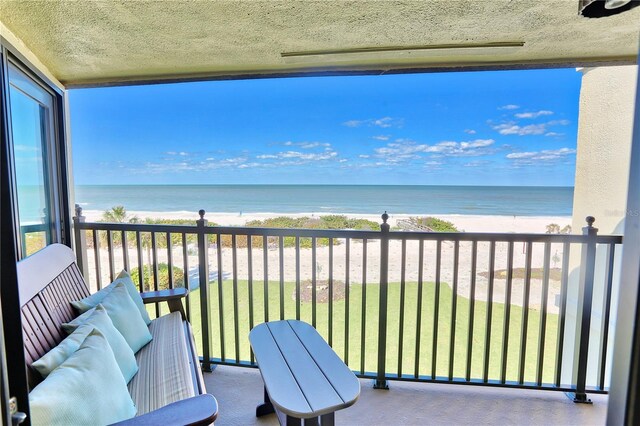 7480 Bayshore Dr Unit 402, Treasure Island, FL 33706 - balcony with view of water and beach
