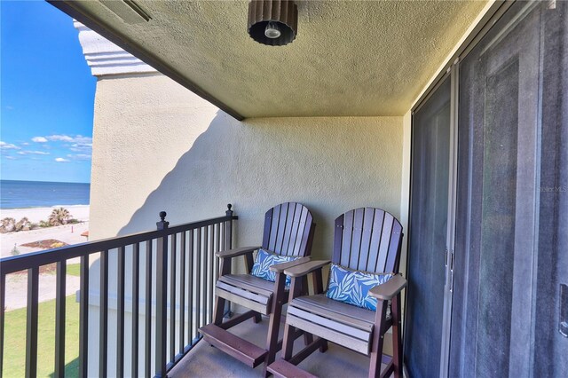 7480 Bayshore Dr Unit 402, Treasure Island, FL 33706 - balcony featuring view of water and beach