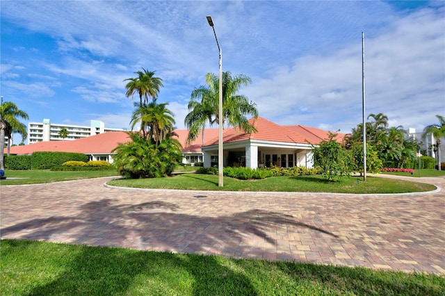 7872 Sailboat Key Blvd S Unit 306, South Pasadena, FL 33707 - exterior space with a lawn
