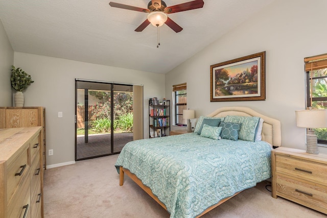bedroom featuring light colored carpet, vaulted ceiling, a ceiling fan, and access to exterior