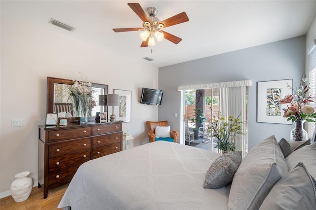 708 Sandy Hills Ave, Tarpon Springs, FL 34689 - bedroom featuring access to outside, light wood-type flooring, multiple windows, and a ceiling fan
