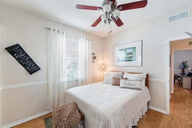 708 Sandy Hills Ave, Tarpon Springs, FL 34689 - bedroom with light wood-type flooring and ceiling fan