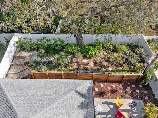 708 Sandy Hills Ave, Tarpon Springs, FL 34689 - fenced backyard with a patio