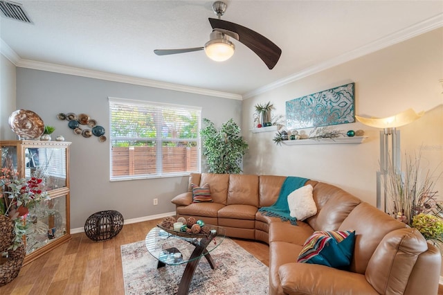 708 Sandy Hills Ave, Tarpon Springs, FL 34689 - living area featuring a ceiling fan, crown molding, and wood finished floors