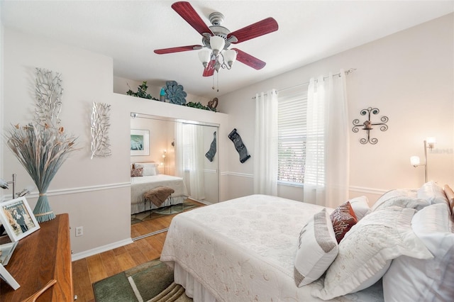 708 Sandy Hills Ave, Tarpon Springs, FL 34689 - bedroom with wood finished floors and ceiling fan