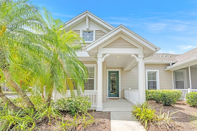 entrance to property with a porch