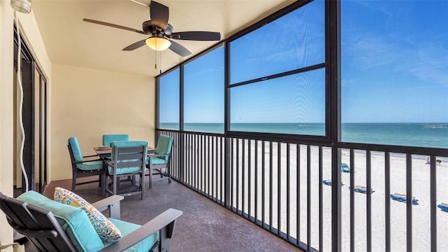 13720 Gulf Blvd Unit 305, Madeira Beach, FL 33708 - sunroom with a beach view and a water view