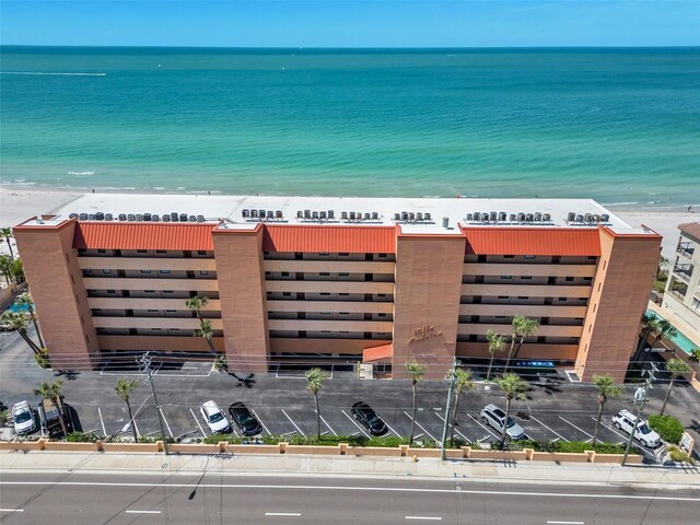 13720 Gulf Blvd Unit 305, Madeira Beach, FL 33708 - view of building exterior with a view of the beach and a water view