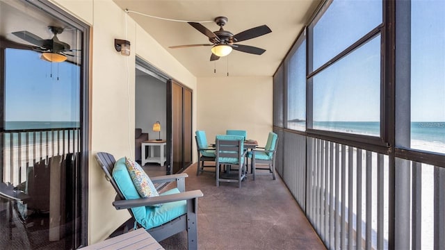 13720 Gulf Blvd Unit 305, Madeira Beach, FL 33708 - sunroom featuring a wealth of natural light, outdoor dining space, and ceiling fan