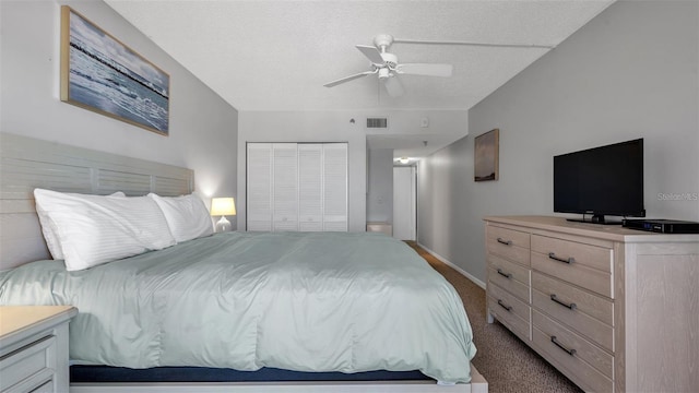 13720 Gulf Blvd Unit 305, Madeira Beach, FL 33708 - bedroom with carpet flooring, visible vents, a closet, baseboards, and a ceiling fan