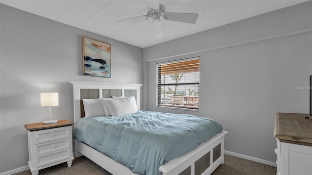 13720 Gulf Blvd Unit 305, Madeira Beach, FL 33708 - bedroom featuring a textured ceiling, a ceiling fan, carpet flooring, and baseboards