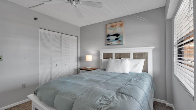 13720 Gulf Blvd Unit 305, Madeira Beach, FL 33708 - bedroom featuring a closet, carpet flooring, a ceiling fan, and baseboards