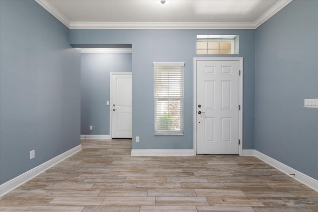 11442 Crowned Sparrow Ln, Tampa, FL 33626 - entrance foyer featuring ornamental molding, baseboards, and light wood-type flooring