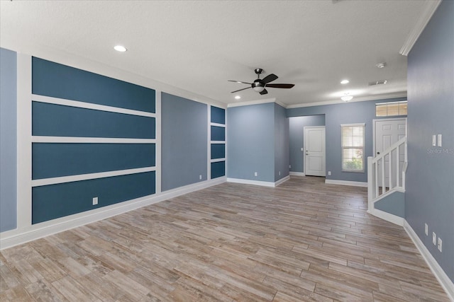 11442 Crowned Sparrow Ln, Tampa, FL 33626 - spare room with recessed lighting, wood finished floors, baseboards, a ceiling fan, and a textured ceiling