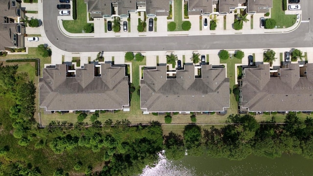 11442 Crowned Sparrow Ln, Tampa, FL 33626 - bird's eye view featuring a water view and a residential view
