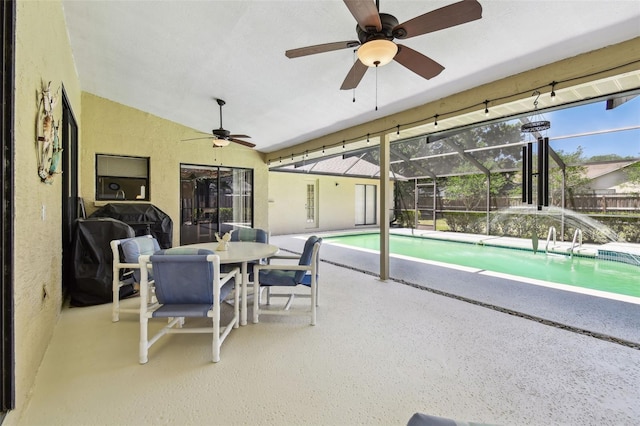 2914 Timber Knoll Dr, Valrico, FL 33596 - sunroom with ceiling fan, a swimming pool, vaulted ceiling, and outdoor dining space