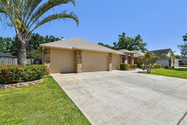 2914 Timber Knoll Dr, Valrico, FL 33596 - ranch-style home with brick siding, an attached garage, driveway, and a chimney