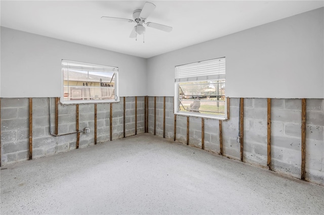 unfurnished room featuring a ceiling fan