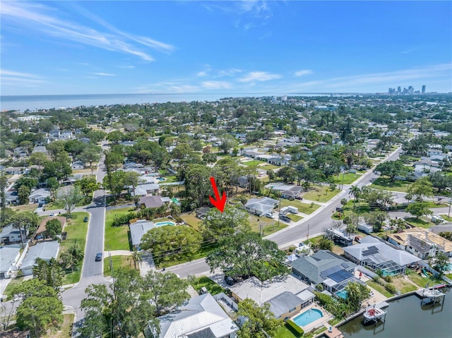 aerial view with a water view and a residential view