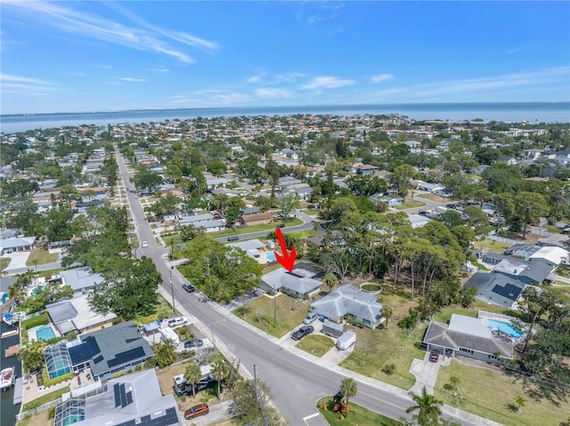 aerial view with a residential view and a water view