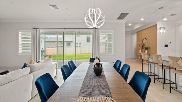 dining space with recessed lighting, ornamental molding, a chandelier, and visible vents