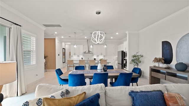 dining room with baseboards, ornamental molding, visible vents, and recessed lighting