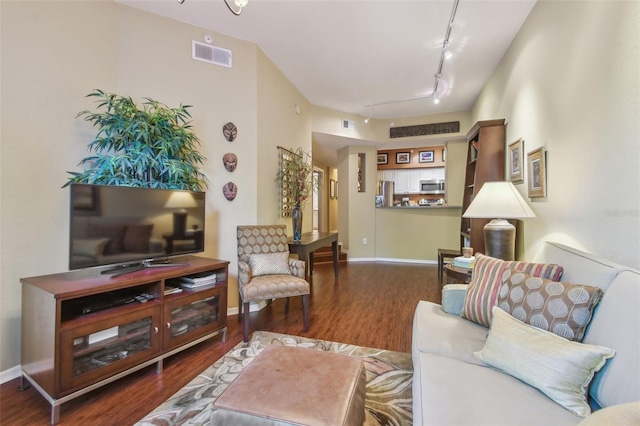 504 S Armenia Ave Unit 1338, Tampa, FL 33609 - living area with track lighting, wood finished floors, and visible vents