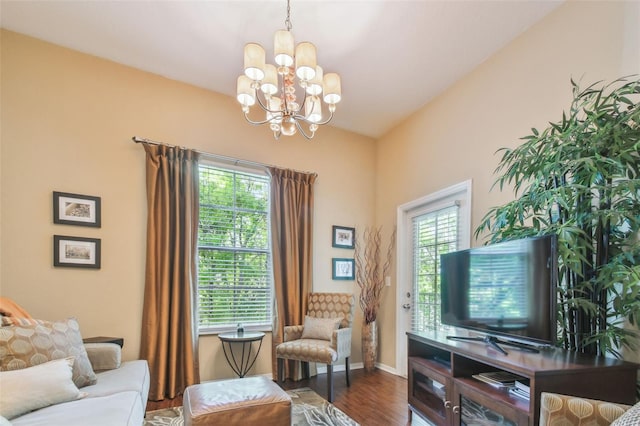 504 S Armenia Ave Unit 1338, Tampa, FL 33609 - living area with dark wood-style flooring, baseboards, a chandelier, and plenty of natural light