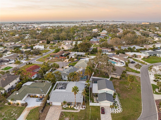 aerial view at dusk with a residential view