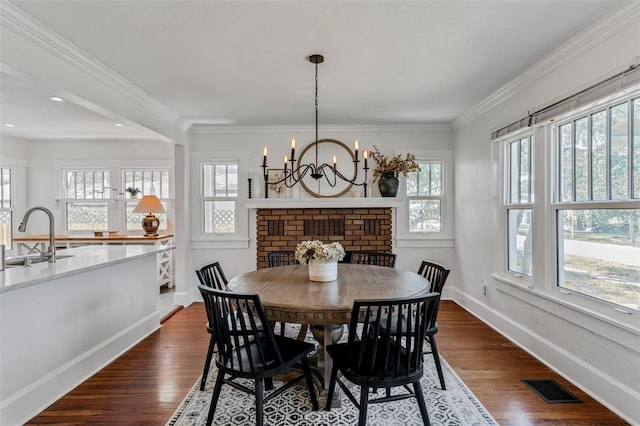 dining space featuring plenty of natural light, visible vents, and baseboards