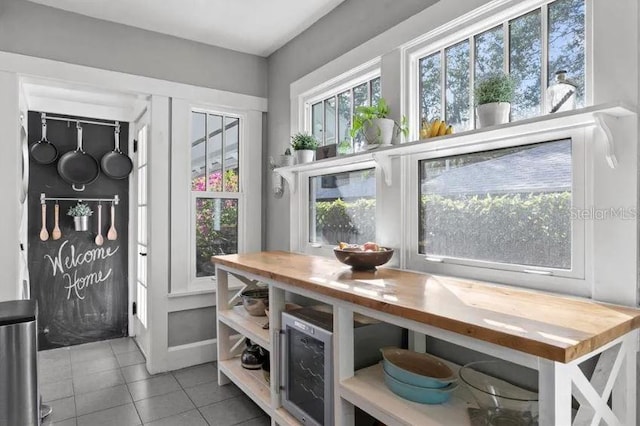 interior space featuring plenty of natural light and baseboards