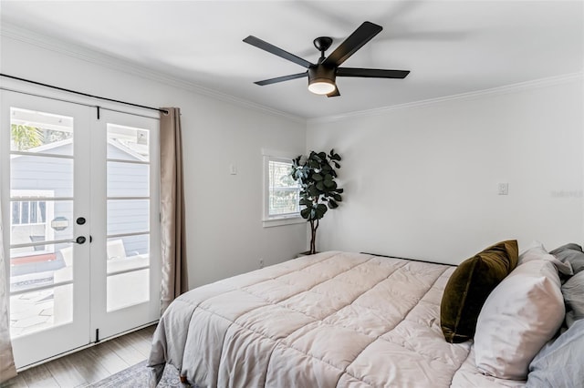 bedroom with french doors, a ceiling fan, wood finished floors, and ornamental molding