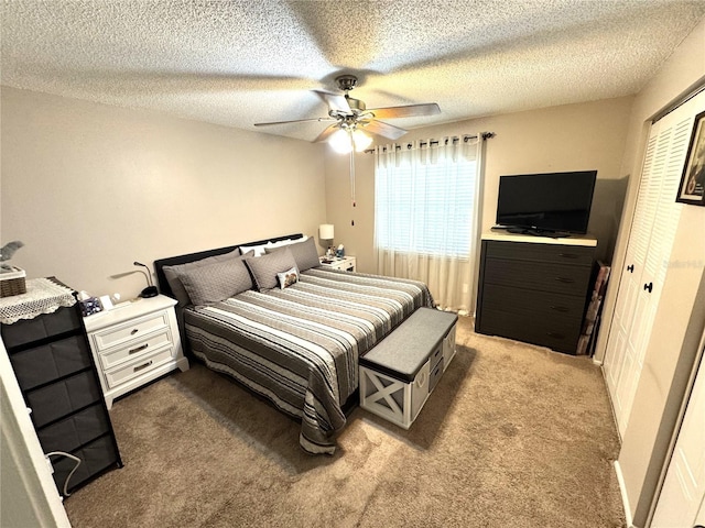 13924 Pathfinder Dr, Tampa, FL 33625 - bedroom featuring carpet flooring, a textured ceiling, ceiling fan, and a closet