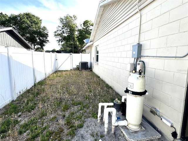 13924 Pathfinder Dr, Tampa, FL 33625 - fenced backyard featuring central AC unit
