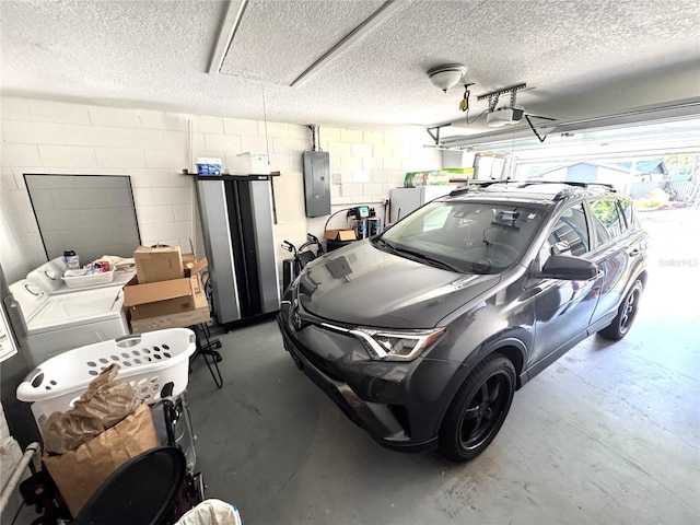 13924 Pathfinder Dr, Tampa, FL 33625 - garage with a garage door opener, electric panel, and concrete block wall