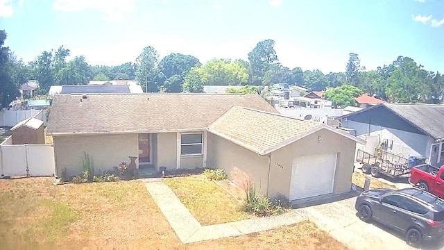 13924 Pathfinder Dr, Tampa, FL 33625 - ranch-style home featuring stucco siding and roof with shingles