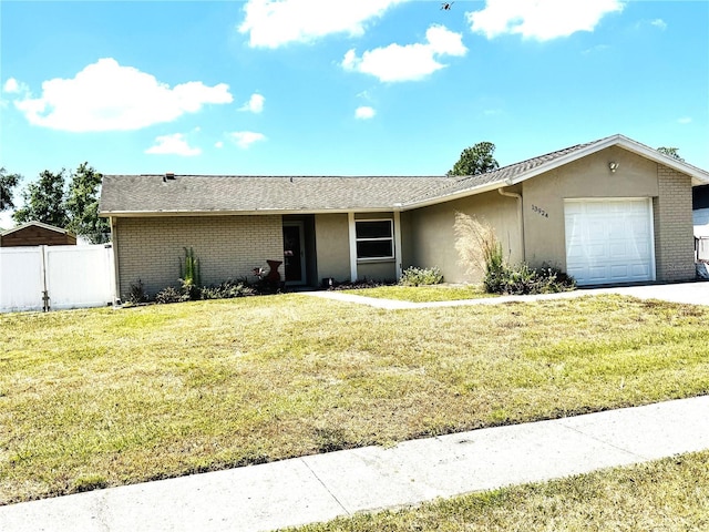 13924 Pathfinder Dr, Tampa, FL 33625 - single story home with a garage, stucco siding, and brick siding