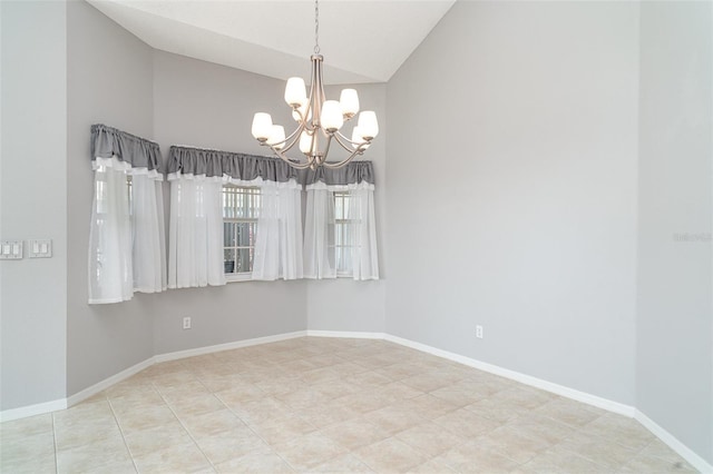tiled spare room featuring an inviting chandelier, baseboards, and high vaulted ceiling