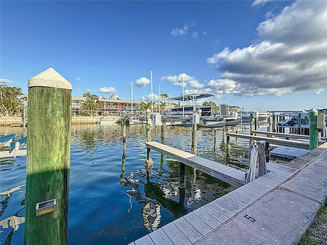2600 N Paula Dr Unit 2B, Dunedin, FL 34698 - dock area with a water view and boat lift