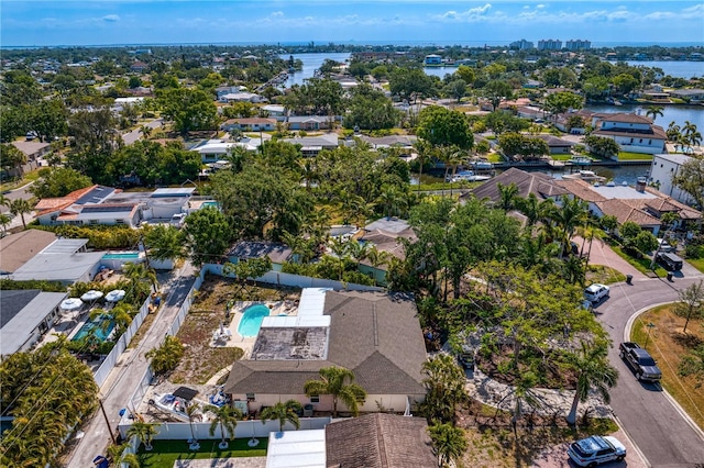 birds eye view of property featuring a water view and a residential view