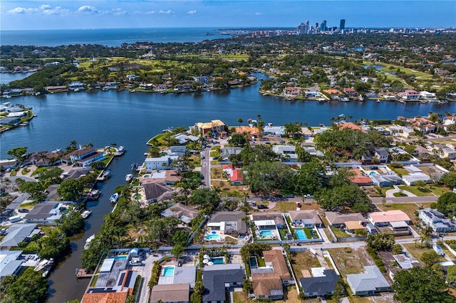 birds eye view of property featuring a residential view and a water view