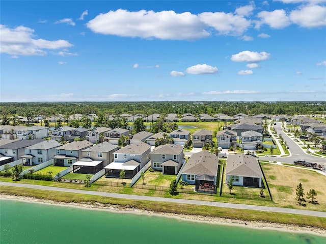 aerial view with a residential view and a water view