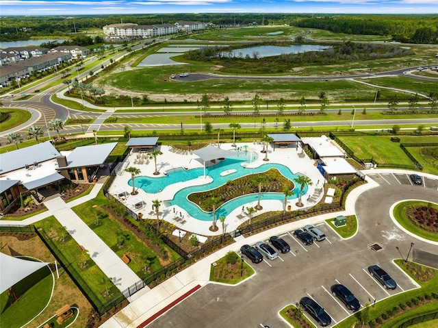 birds eye view of property featuring a water view