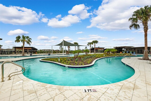 community pool with a patio