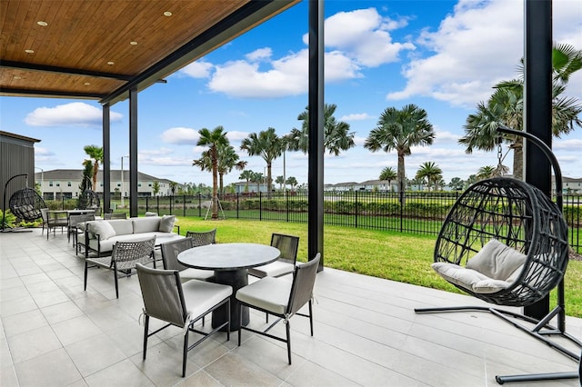 exterior space featuring an outdoor living space, a fenced backyard, and outdoor dining area